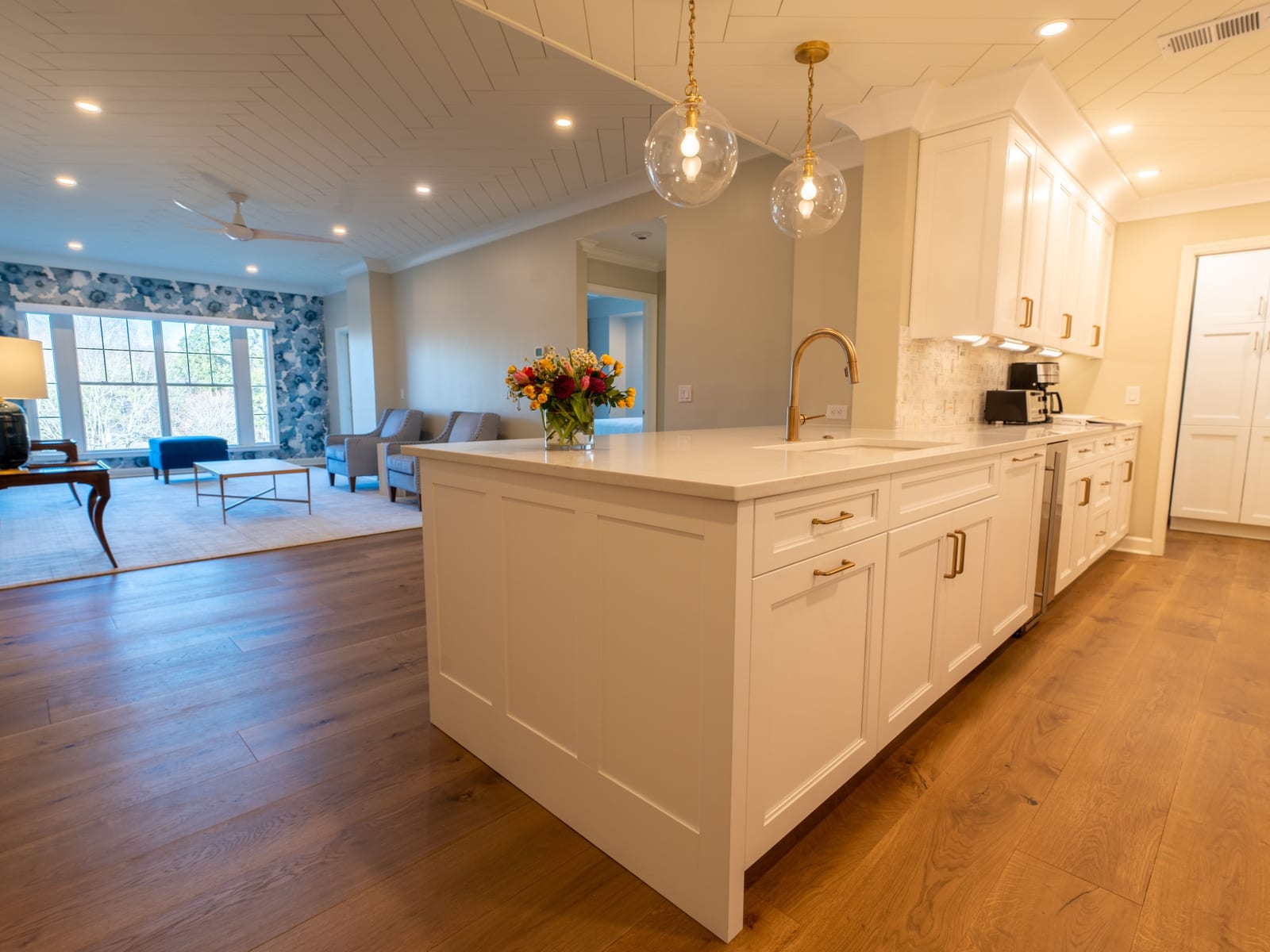 A custom kitchen with refinished cabinetry and a smooth, consistent sheen across every door.