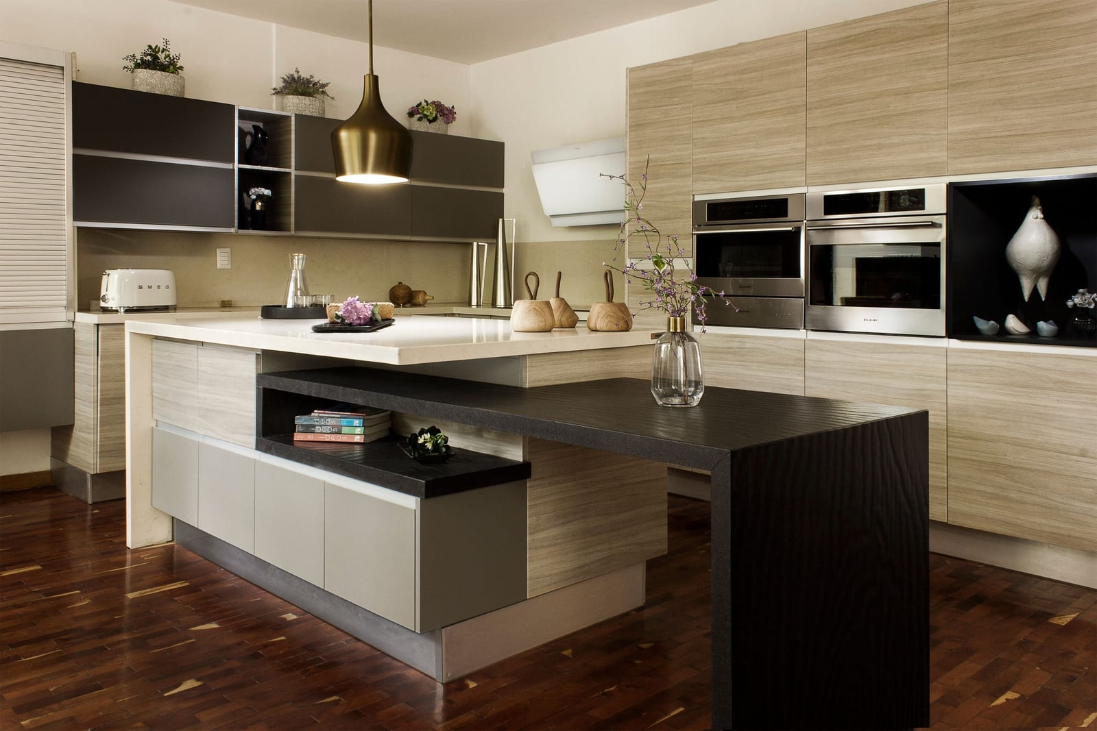 A designer kitchen with refinished cabinetry, the doors and face frames carrying an even, low-sheen finish.